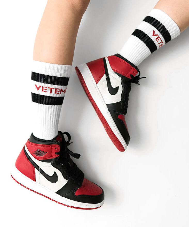 red and white trainers